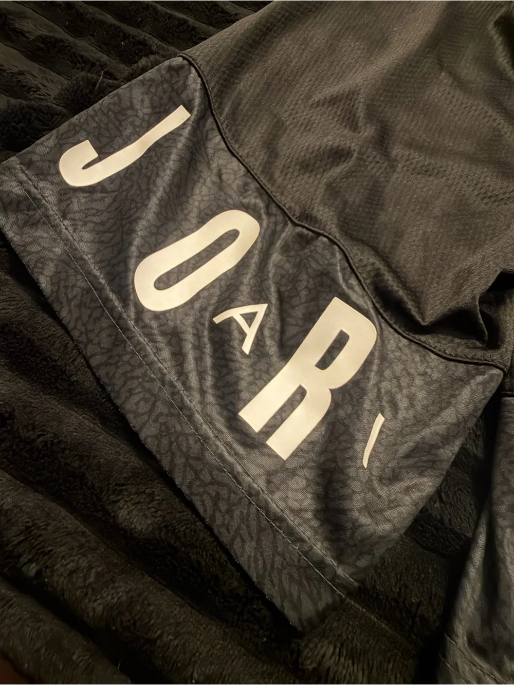 Jordan Black Athletic Mesh Shorts with Logo Hem